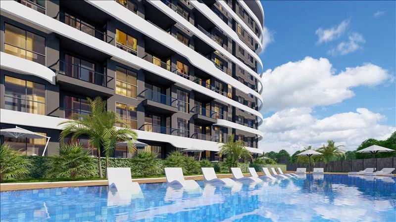 Новая резиденция с бассейнами, спа-центром и собственным пляжем рядом с аэропортом, Алания, Турция