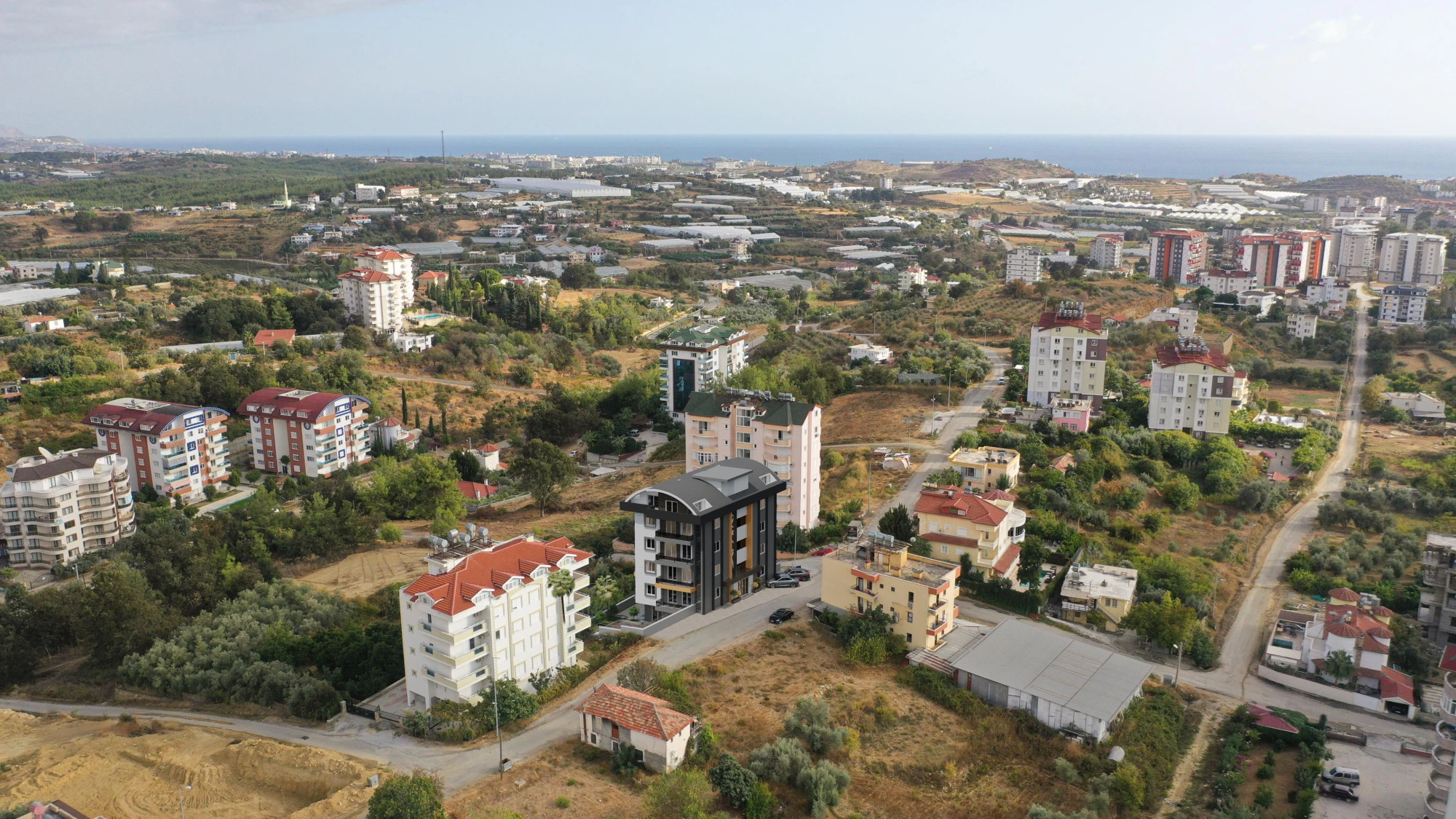 Просторные апартаменты в жилом комплексе с бассейном и тренажерным залом, Авсаллар, Турция